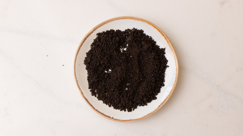 Oreo cookie crumbs on plate