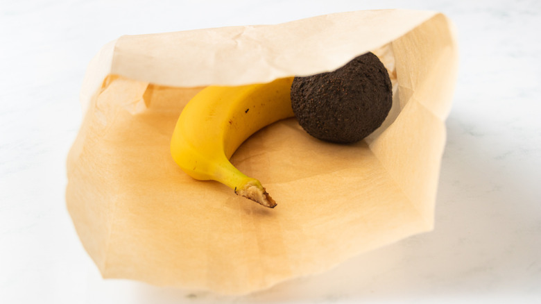 Banana and avocado in paper bag