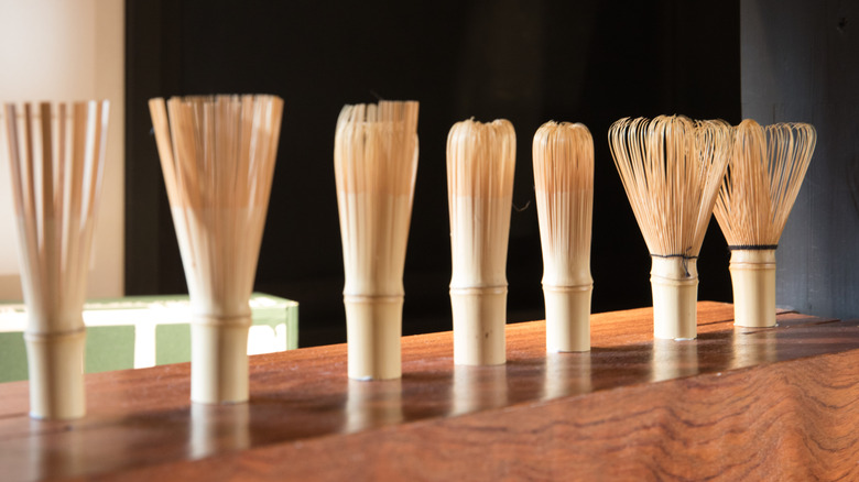 line of different matcha whisks