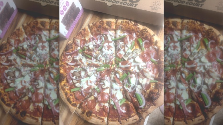 Costco food court pizza with added ingredients