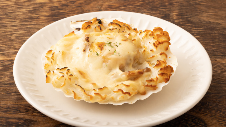 creamy scallop dish served in shell