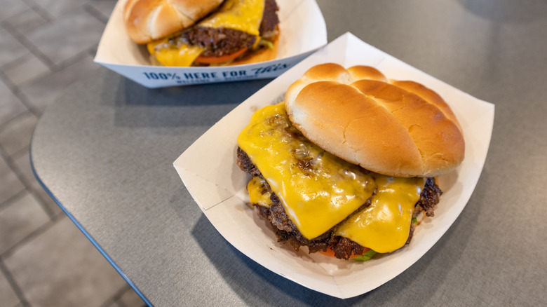 Pair of Culver's burgers in baskets on a table.