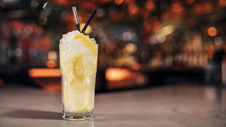 Tom Collins cocktail on bar surface