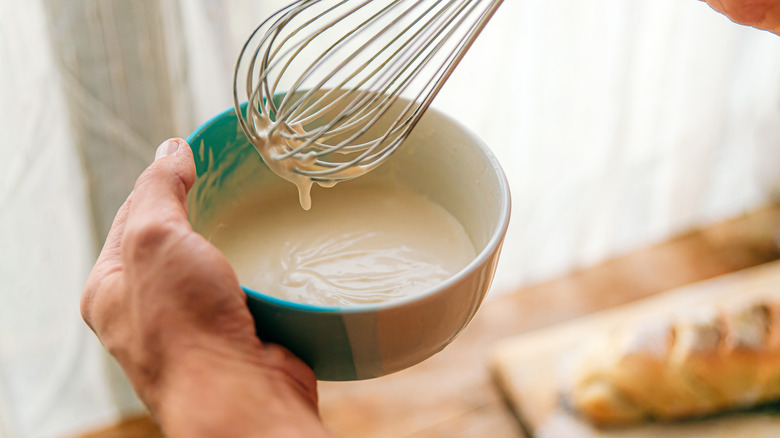 Home cook whisking yum yum sauce