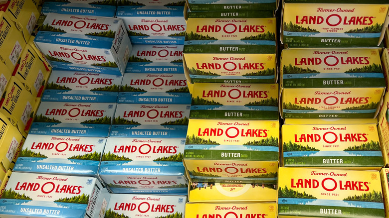 Packages of Land O'Lakes butter at a grocery store