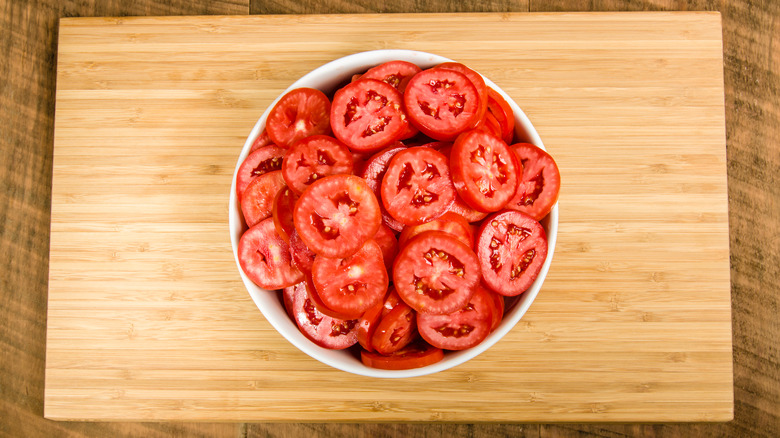 Perfectly ripe sliced tomatoes in bowl