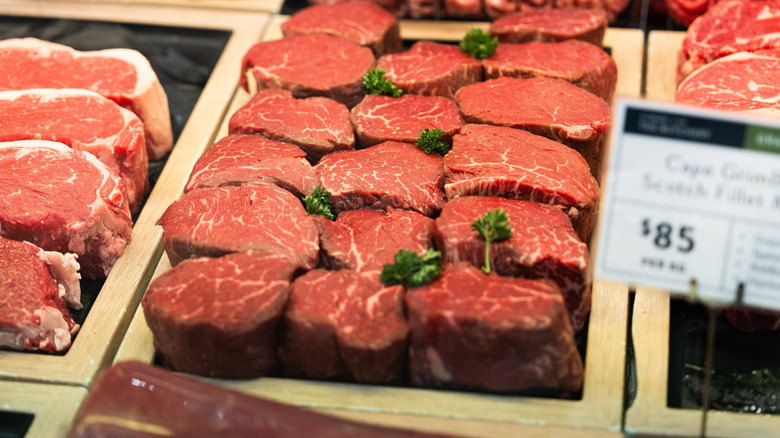 A display of fresh steaks at a butcher