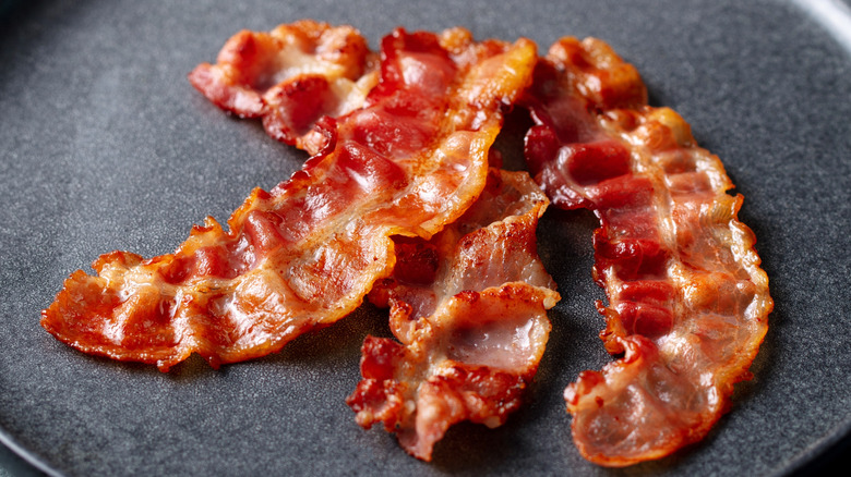 A plate of crispy bacon strips