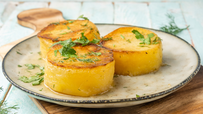 plate of melting fondant potatoes