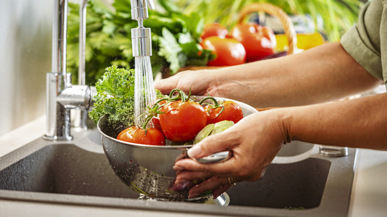 washing fresh produce in sink