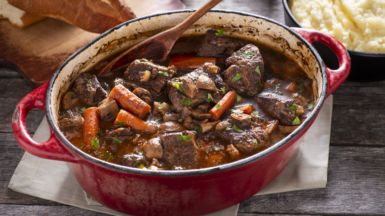 Dutch oven with beef and carrots