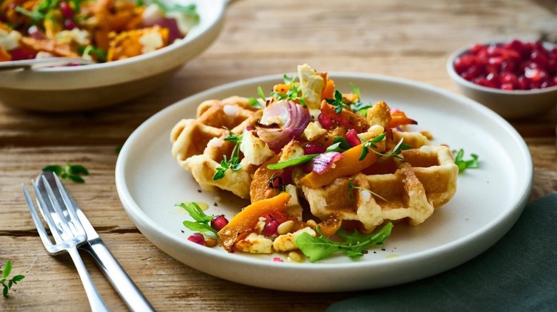 St. Pierre's Belgian waffle topped with pumpkin, onion and arugula