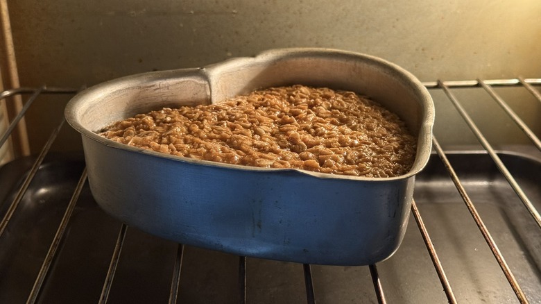 Heart-shaped pan full of baked oatmeal in oven