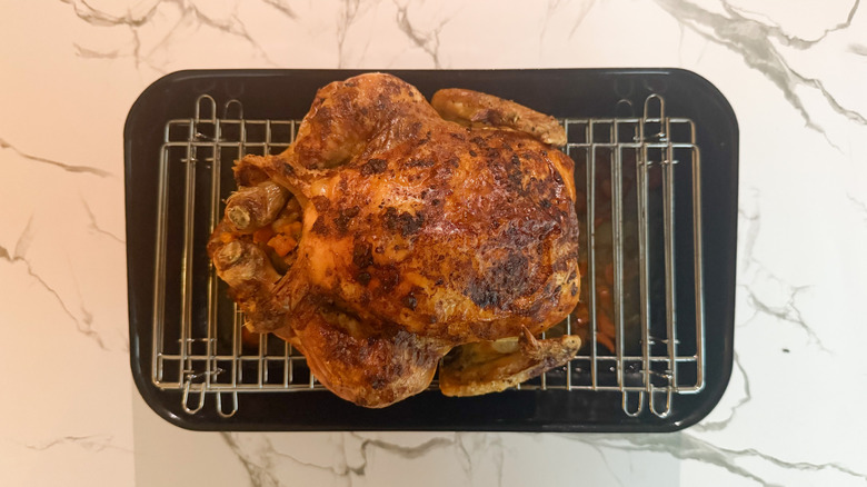 julia child roast chicken in a pan