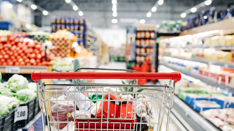 A close-up of a shopping cart in a grocery store