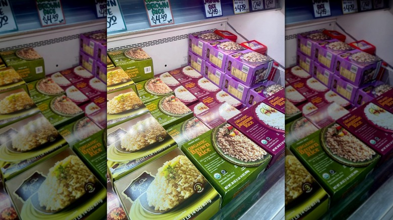 Boxes of frozen rice in freezer section at Trader Joe's
