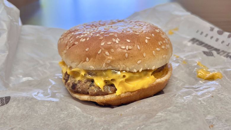 Double cheeseburger side view