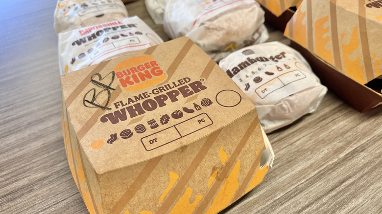 Close up of burgers on a table