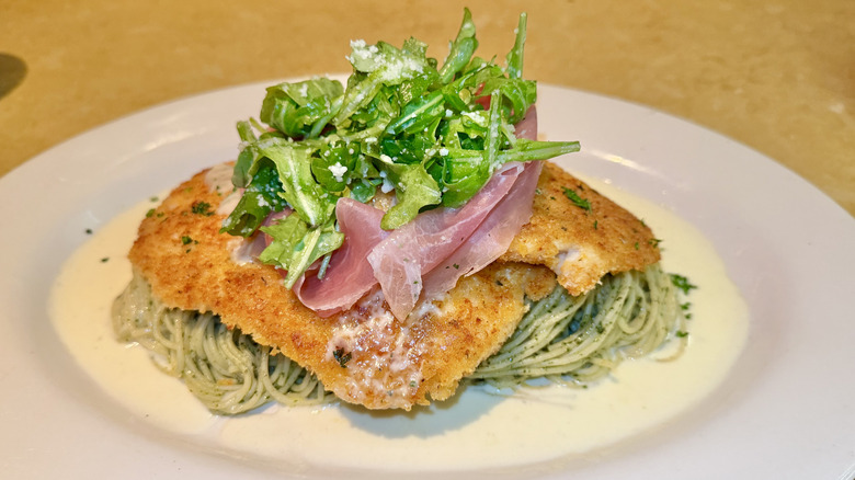 Chicken Bellagio with arugula on top
