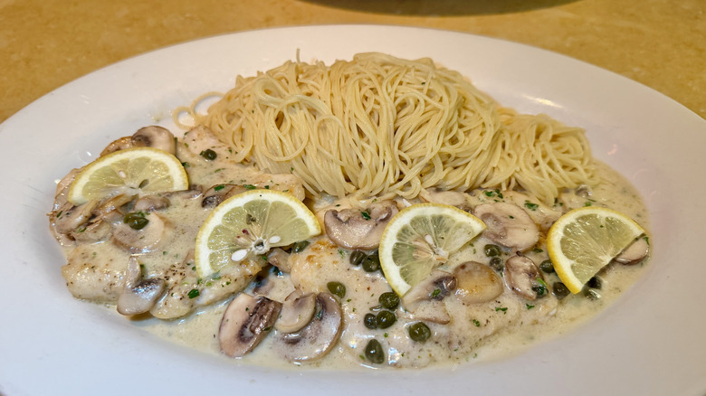 Chicken Piccata with lemons on top