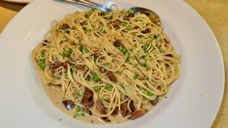 Pasta Carbonara in a bowl with a spoon