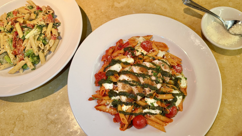 Evelyn's pasta and Tomato Basil pasta dishes with Parmesan