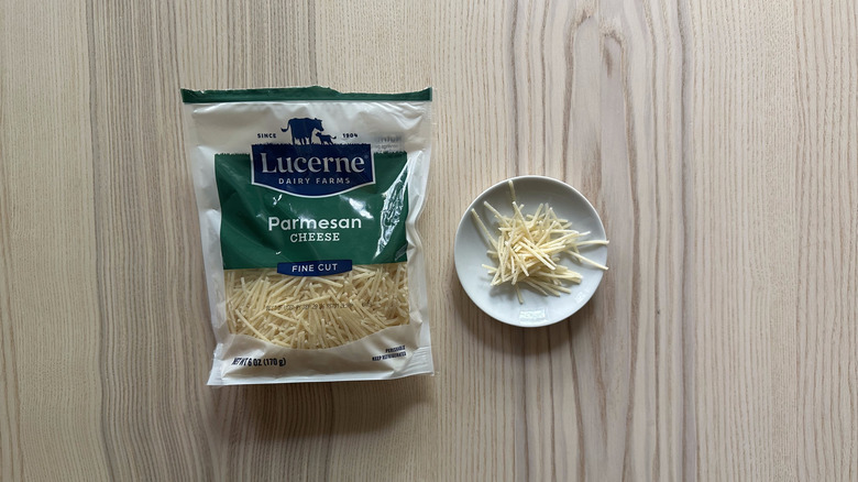 Lucerne Fine Cut Parmesan Cheese on wooden table