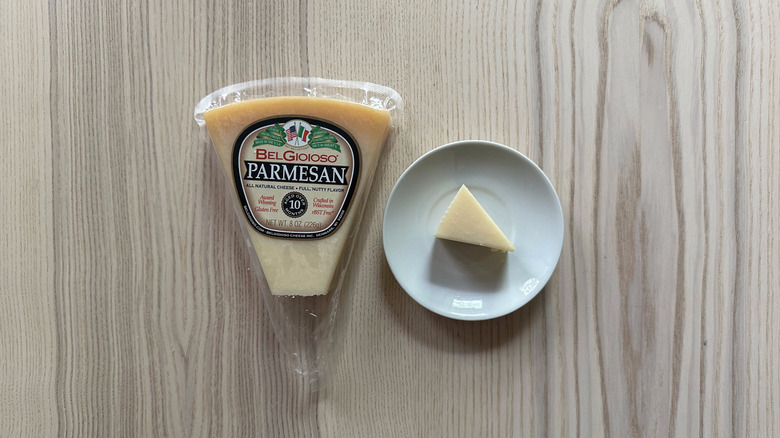 BelGioioso Parmesan Cheese on wooden table