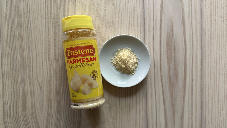 Pastene Grated Parmesan Cheese on wooden table