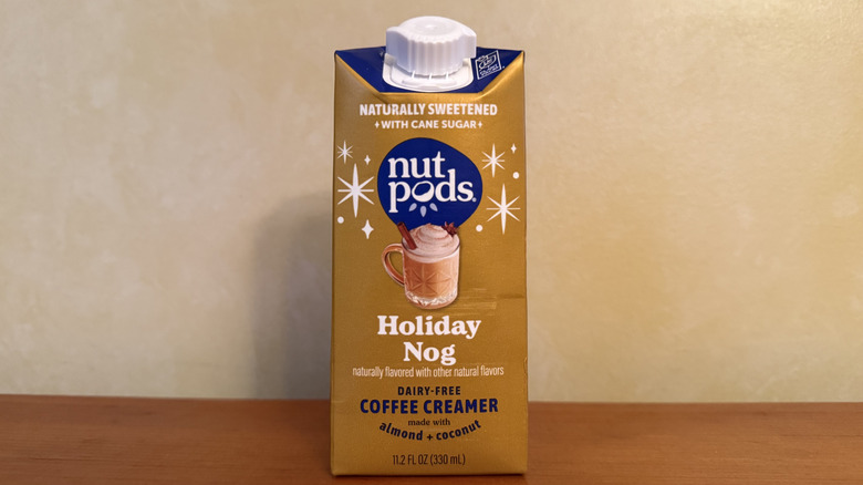 Carton of nutpods creamer on wooden table