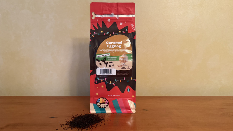 Bag of coffee beside grounds