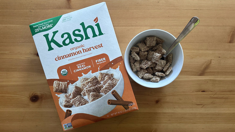 Kashi Organic Cinnamon Harvest cereal box and a white bowl filled with cereals