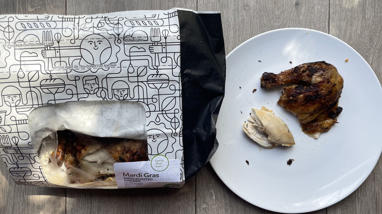 Mardi Gras rotisserie chicken on a plate and in bag container