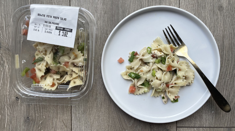 Pasta salad in container and on a plate