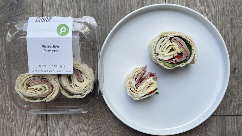Italian-style pinwheels in container and on a plate