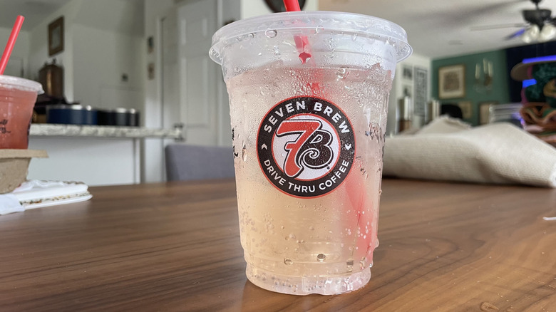 Peaches and Cream soda in a cup on a table