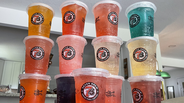 Thirteen different 7 brew fizz drinks stacked