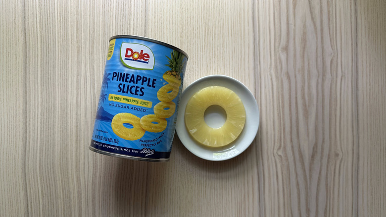 Dole Pineapple Slices on wooden table