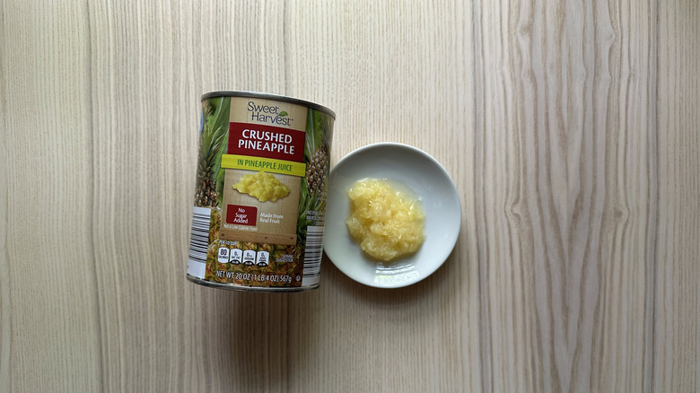 Sweet Harvest Crushed Pineapple on wooden table
