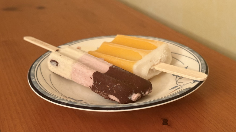 Neapolitan pop and orange n' cream pop on plate