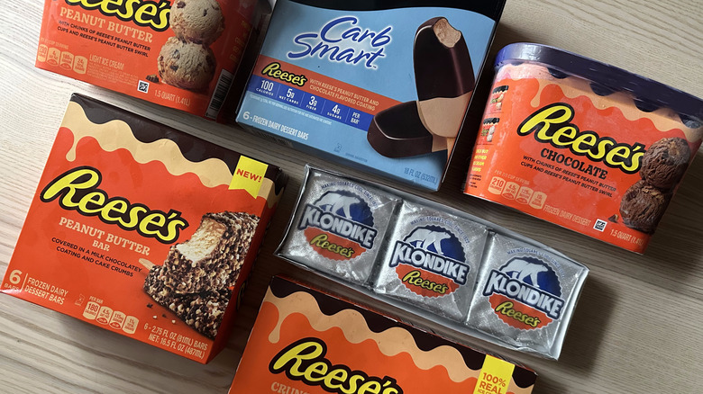 Reese's ice cream products arranged on wooden table