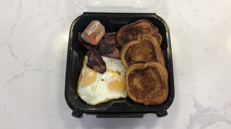 Denny's French Toast Slam in a to-go container