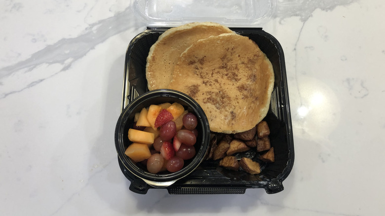 Denny's Plant-based Pancake Slam in a to-go container