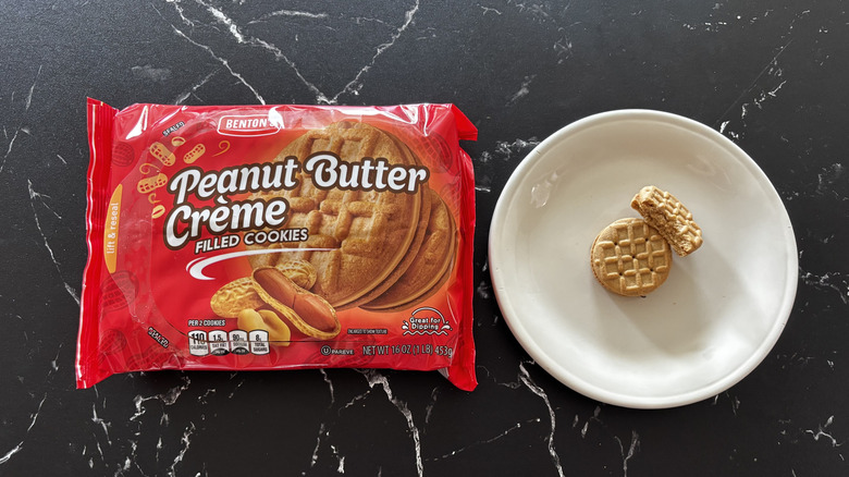 Aldi peanut butter creme cookies package next to cookies on plate