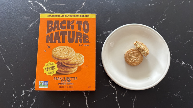 Back to Nature peanut butter cookie box next to cookies on plate