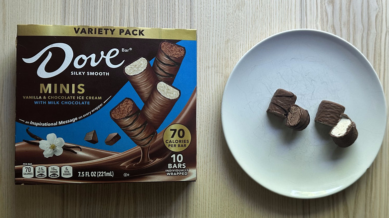 Dove Milk Chocolate Minis Ice Cream Bars sliced and served on white plate with box on the side
