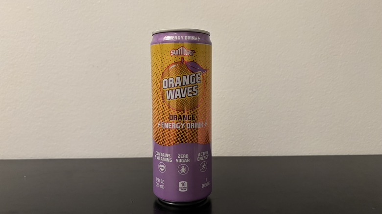 a can of summit orange waves energy drink on a table