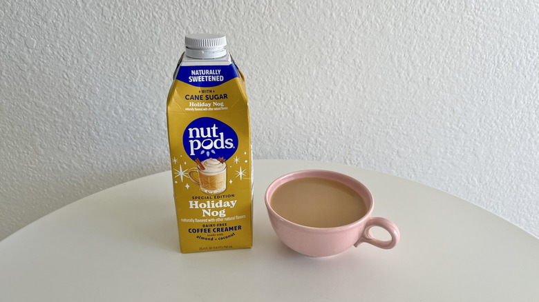 Nutpods Holiday Nog Almond and Coconut Dairy-Free Creamer with coffee