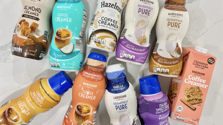 10 Aldi Barissimo coffee creamers in bottles.