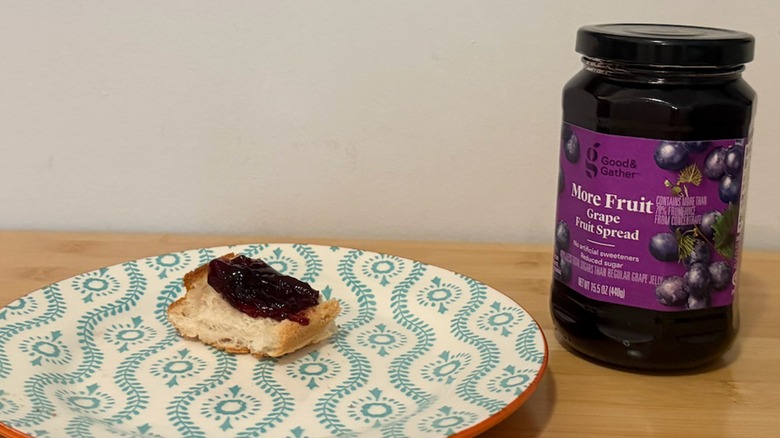 Good & Gather Fruit Spread with a piece of bread and the jelly on top next to it